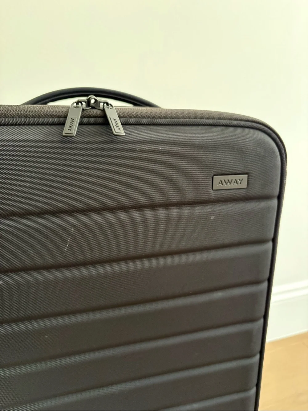 Away Black Carry-On Travel Case with Spinner Wheels (expandable collection)